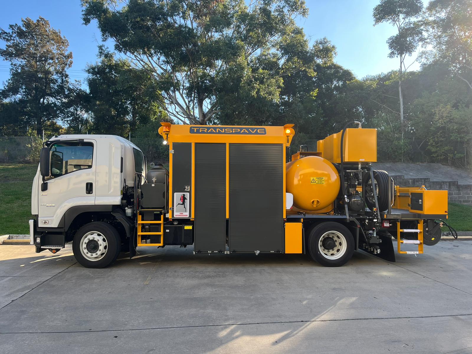 Curb side view of the Transcoater Tack Coater