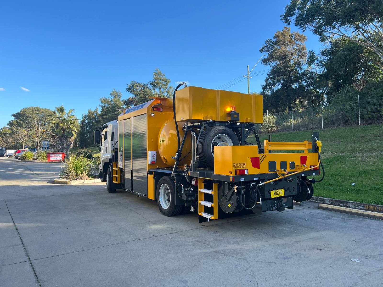 Rear curb side view of the Transcoater Tack Coater